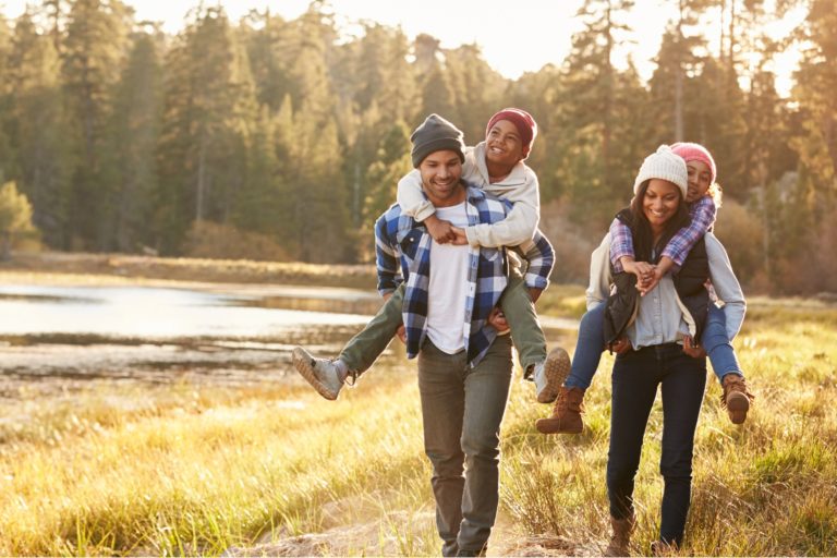 A family hiking in the woods.
